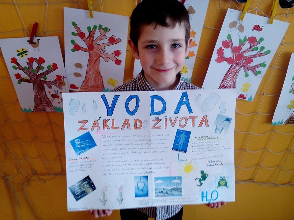 Boy holding paper